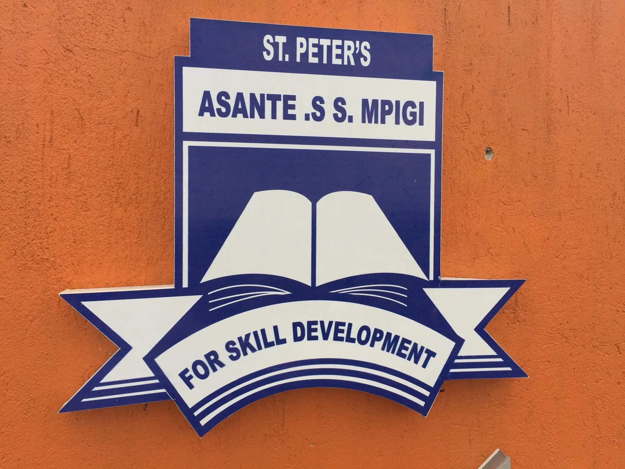 St. Peter's Asante Secondary School Logo